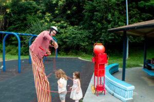 Clown performer O'Ryan the O'Mazing (our hired entertainment for the night) entertaining children with a lasso toy